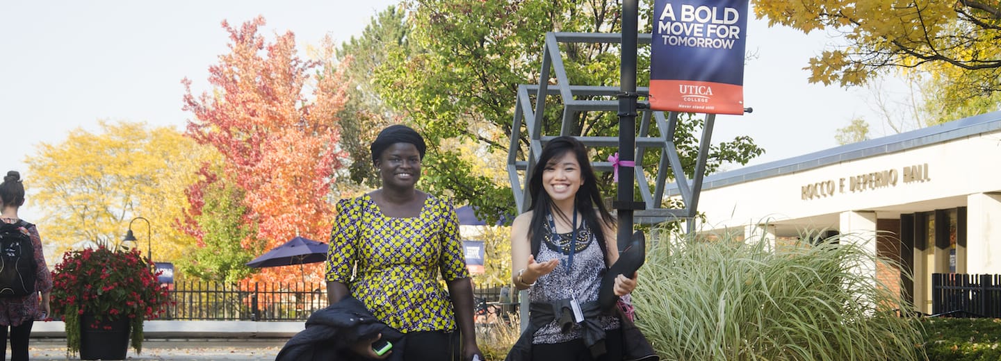 students outside Utica University