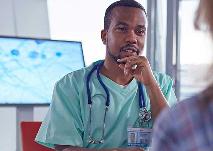 nurse talking with patient